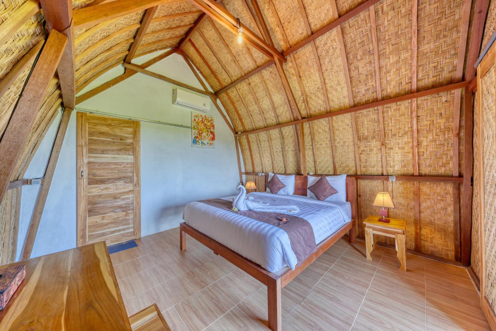 Готель D Sebuluh Bungalow Batumadeg Номер фото